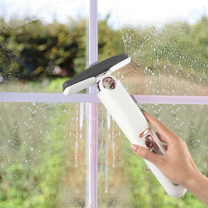 Mini handheld mop with white body, gray head, and water spray stream for windows