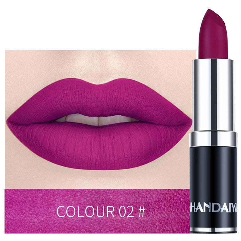 Moisturizing lipstick in bright magenta, shade 02, with silver-and-black tube