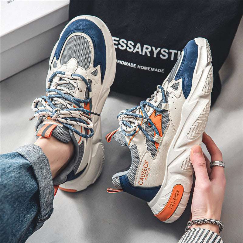 Cream and blue lace-up sneakers with chunky tread sole and blue laces