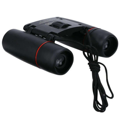 Black binoculars with orange lens openings and top focusing knob, side view