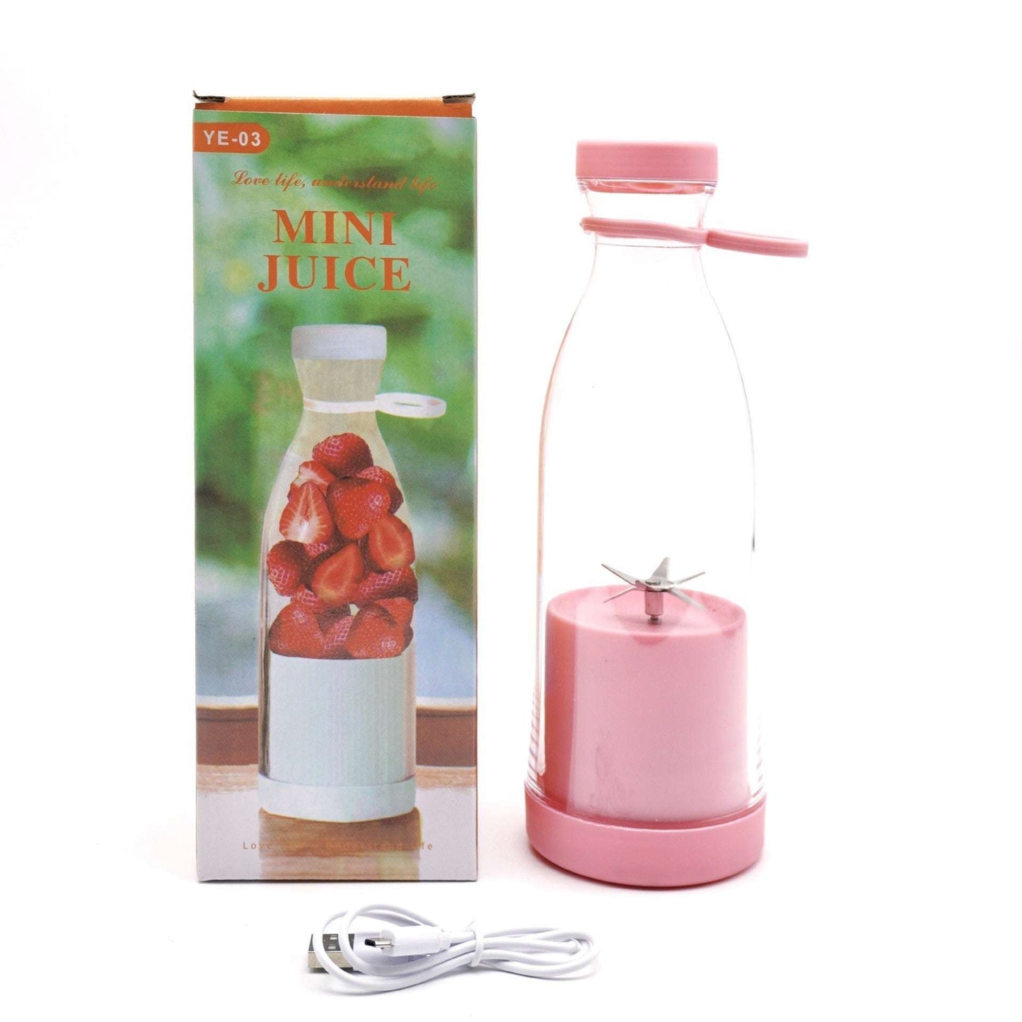Pink mini juice maker with packaging and USB cable on a white background
