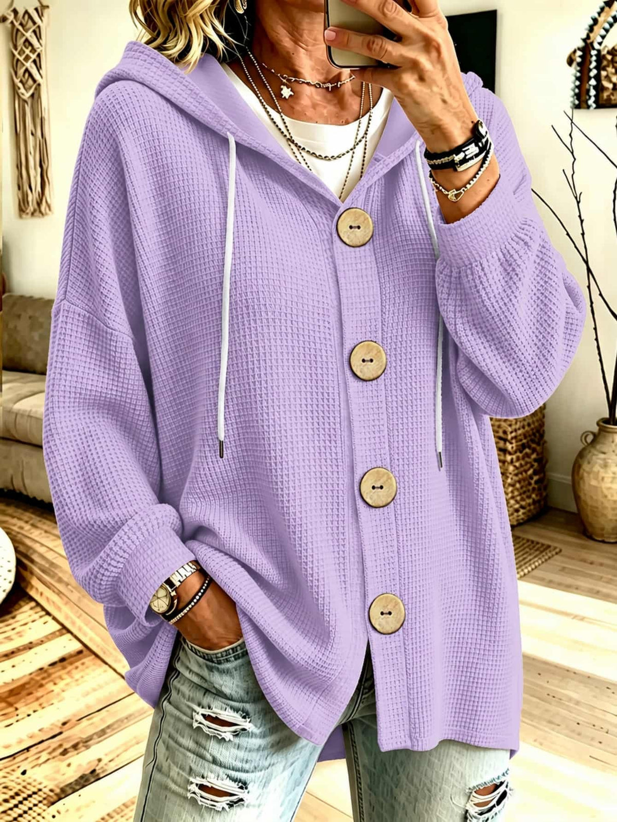 Hooded knit blouse in lavender with long sleeves, button placket, and drawstring ties