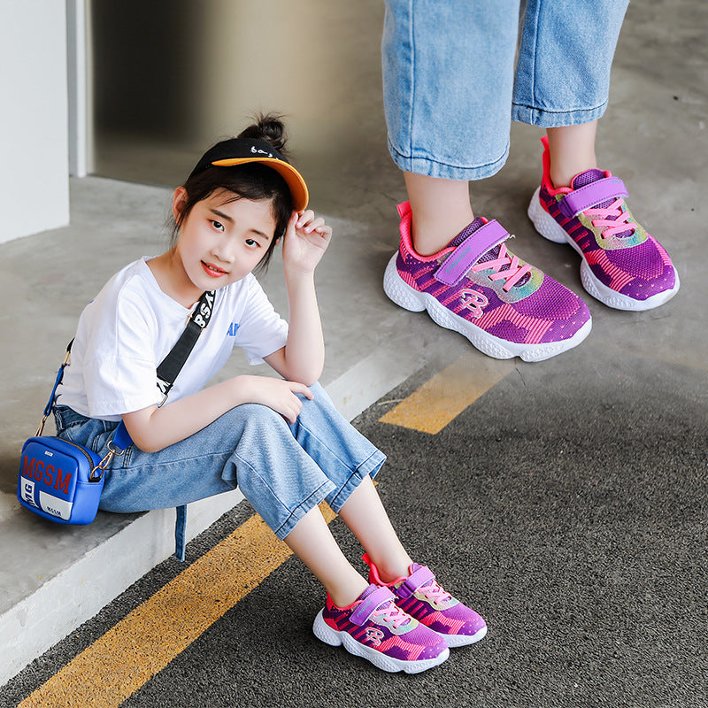 Kids pink/purple sport sneakers with velcro strap and breathable woven upper, EVA sole.