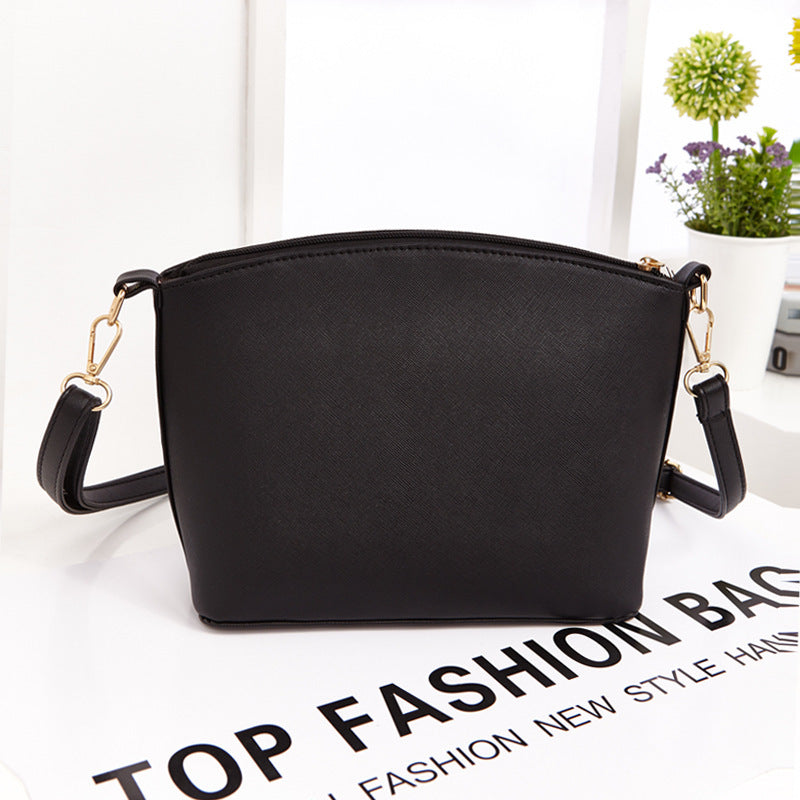 new Handbag Bag Fashion Shoulder cross pattern Fashion shell bag Mini crown Xiekua package