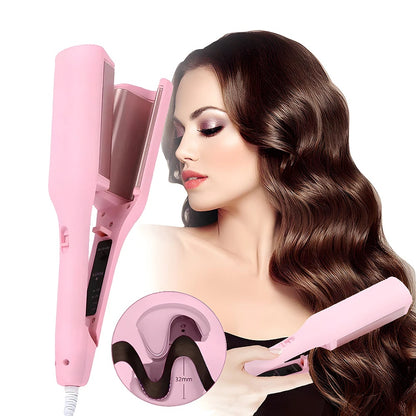Pink hair straightener with a close-up of its design, used by a model with wavy hair.