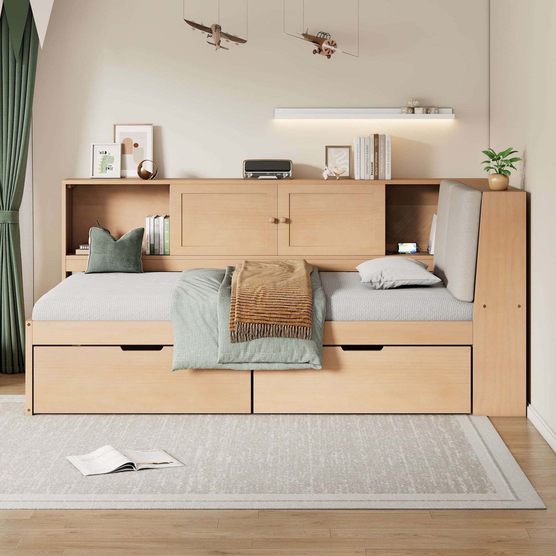 Natural wooden twin daybed with upholstered backrest and fold-out storage drawers