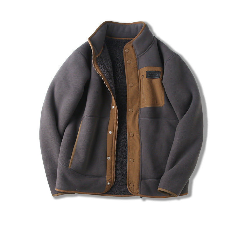 Dark gray fleece-lined thick jacket with tan sherpa lining, snap front, and chest pocket