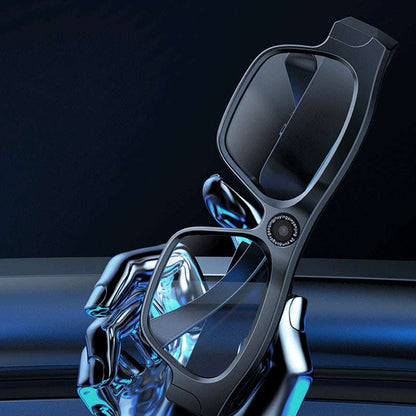 Black eyeglasses with a reflective surface on a dark background