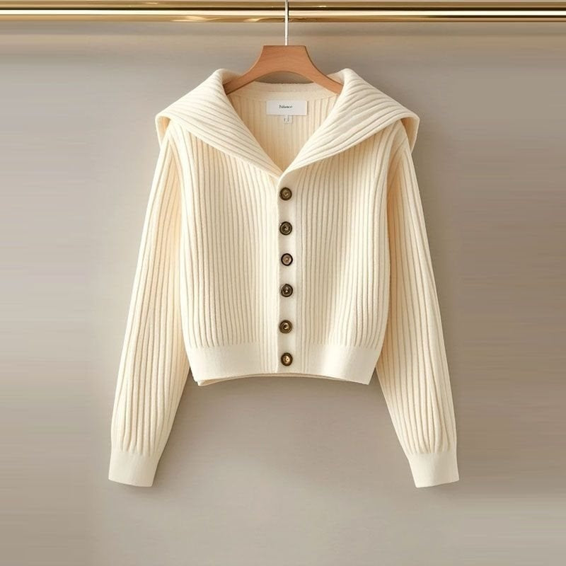 Cream ribbed knit hooded cardigan sweater with long sleeves and button placket