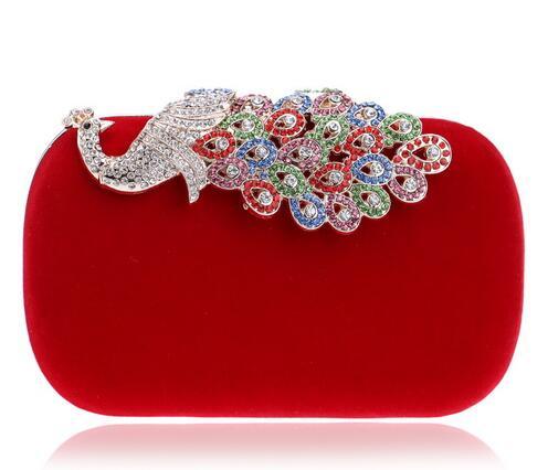 Red velvet oval clutch with multicolor jewel floral fan clasp