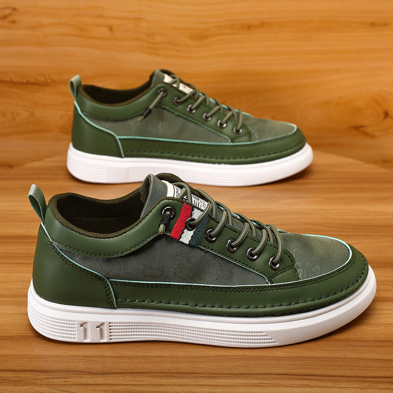 Men's canvas sneaker in dark green with multicolor tongue stripe and white sole