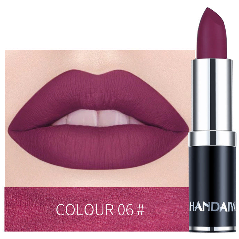 Moisturizing lipstick in berry purple, shade 06, with silver-and-black tube