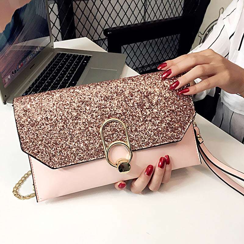 Rose pink glitter envelope clutch with gold ring clasp and chain strap