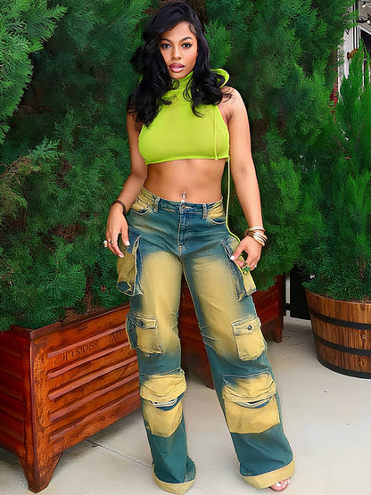 Loose-fitting green workwear jeans with cargo pockets, stitched patches, and distressed finish