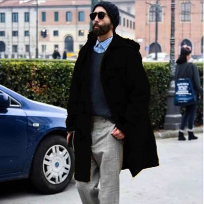 Men’s hooded wool trench coat in black with horn-style button front and flap chest pockets.