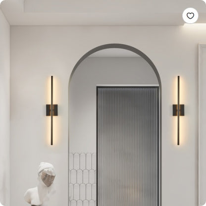 Black minimalist LED wall sconce with vertical light bar and square mount