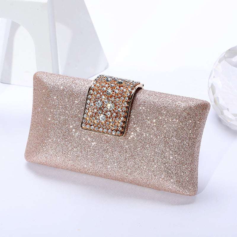Champagne glitter clutch wallet with rhinestone-framed clasp