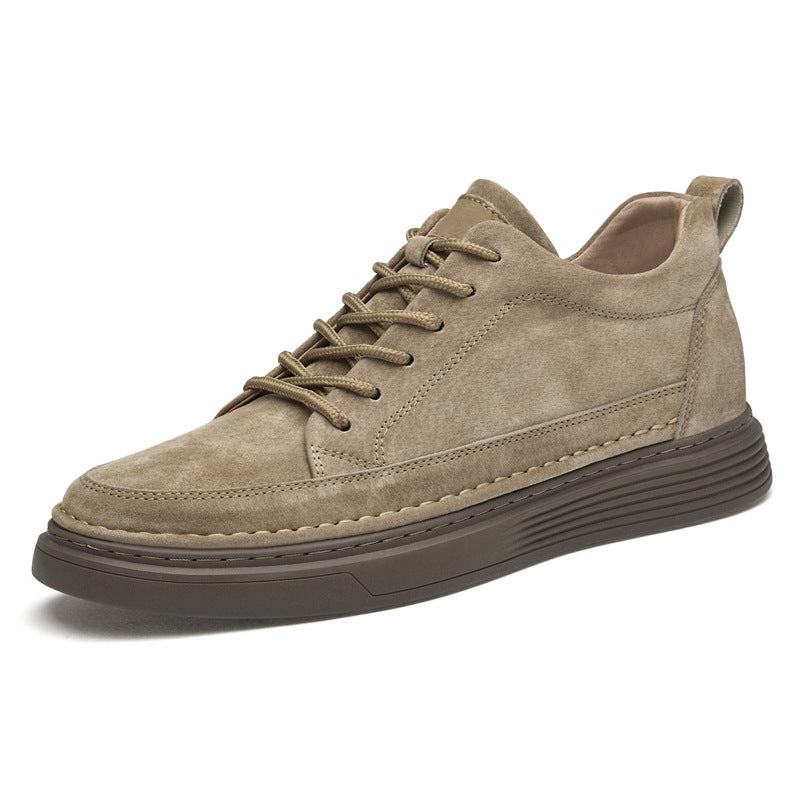 Tan suede lace-up board shoes with thick striped rubber sole and stitched toe panel