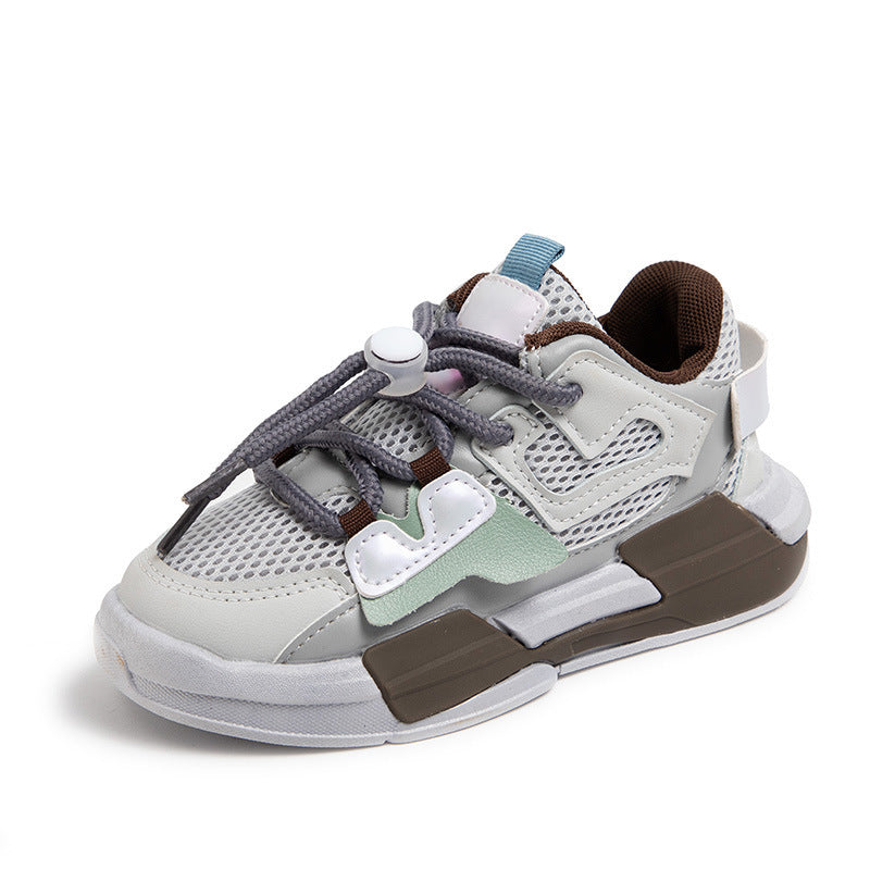 Girls' mesh sneakers in white and gray with green accents and chunky brown sole