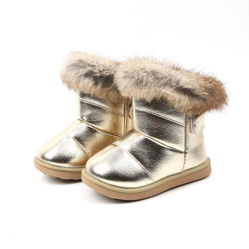 Baby girl snow boots with rabbit fur trim, gold metallic upper and tan-brown fur cuffs.