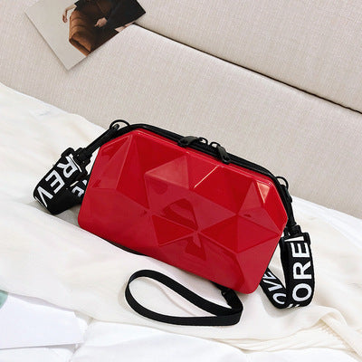 Red geometric mini cosmetic bag with black zipper and wrist strap