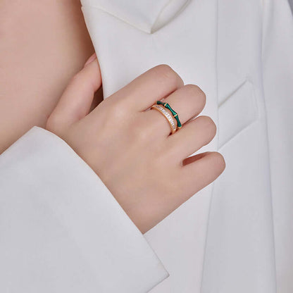 Green enamel open ring with zircon stones worn on a finger