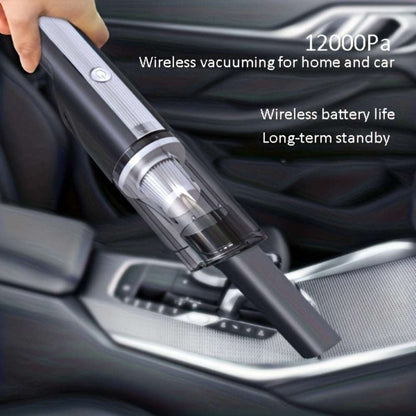 Silver cordless handheld vacuum cleaner cleaning a car seat crevice