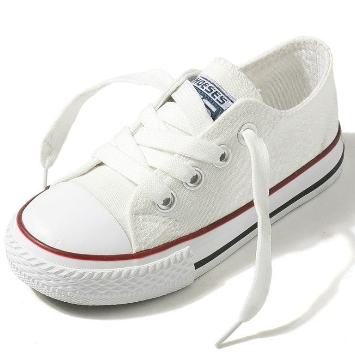 Non-slip canvas baby shoes, white low-top with lace-up front and rubber side stripes