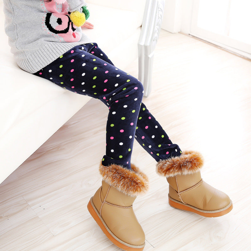 Girls' warm leggings in dark fabric with bright polka dots and ribbed cuffs