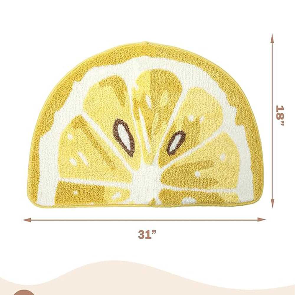 Yellow and white lemon-shaped bath mat with textured non-slip surface