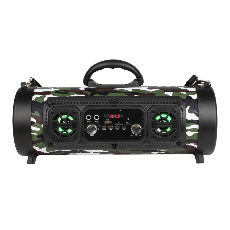 Portable Bluetooth speaker in camouflage with front display and green-lit speaker grilles