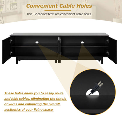 Black TV stand underside with open shelves and cable-routing cutouts