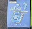 Bluetooth headset retail box showing a transparent headset with over-ear earbud design