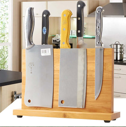 Wood magnetic knife holder with upright slots and five knives on a base