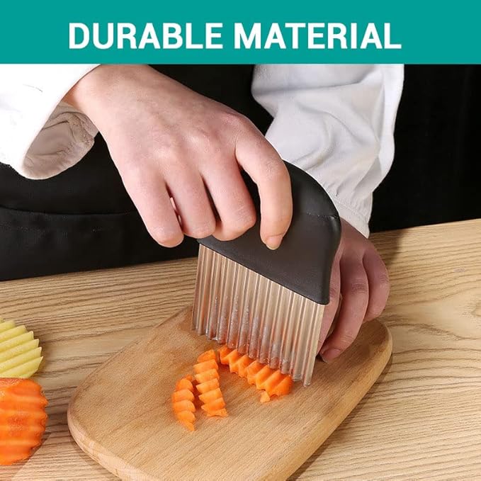 Black crinkle cutter slicer tool with stainless blade, cutting carrot batons