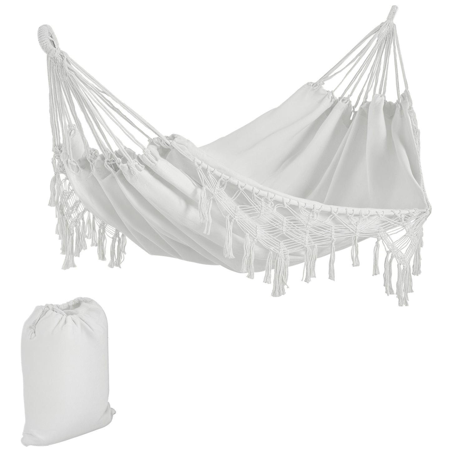 White macrame hammock with tassel fringe and matching storage bag, angled view
