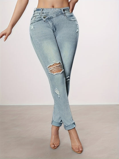 Light blue slim-fit denim leggings with back pockets and large knee rips
