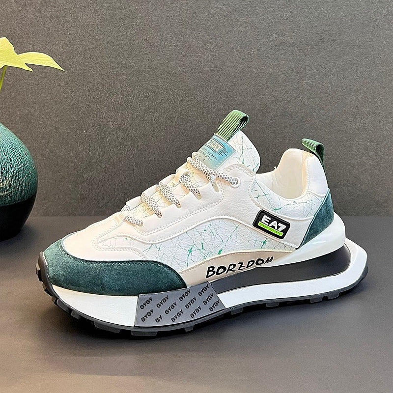 White men’s sneaker with dark green toe panel, green heel tab, teal EAZ tag, and thick sole