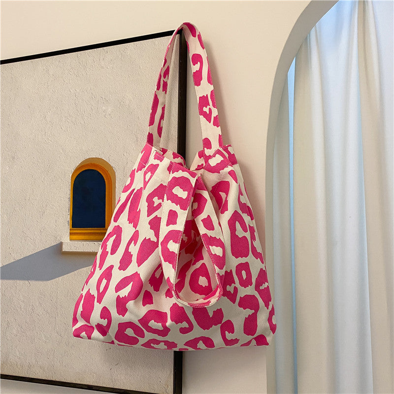 Animal print canvas tote bag, pink and white, gathered top with long strap and loop