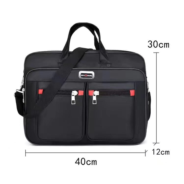 Black laptop messenger bag with two front zip pockets and red-lined zippers