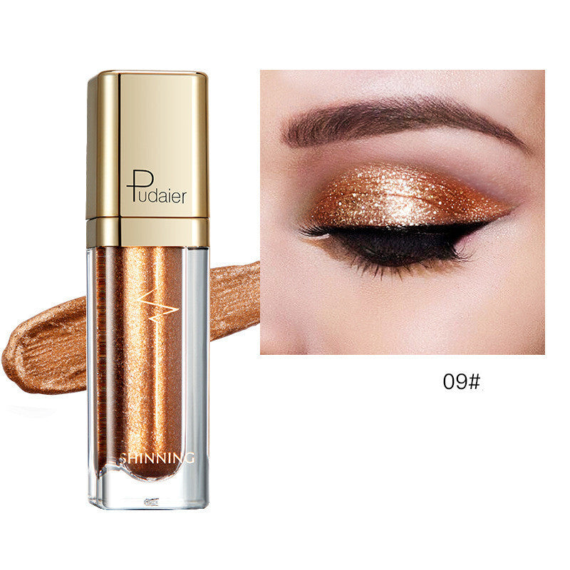 Glitter eyeshadow tube with copper-gold shimmer; swatch on eyelid, shade 09#