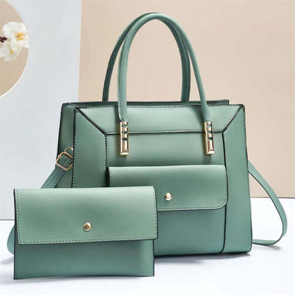 Light green tote bag set with top handles and matching mini crossbody bag