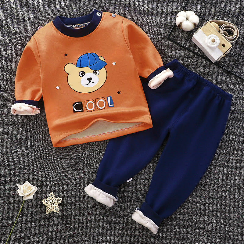 Kids thermal underwear set in orange with bear graphic, long-sleeve top and navy pants.