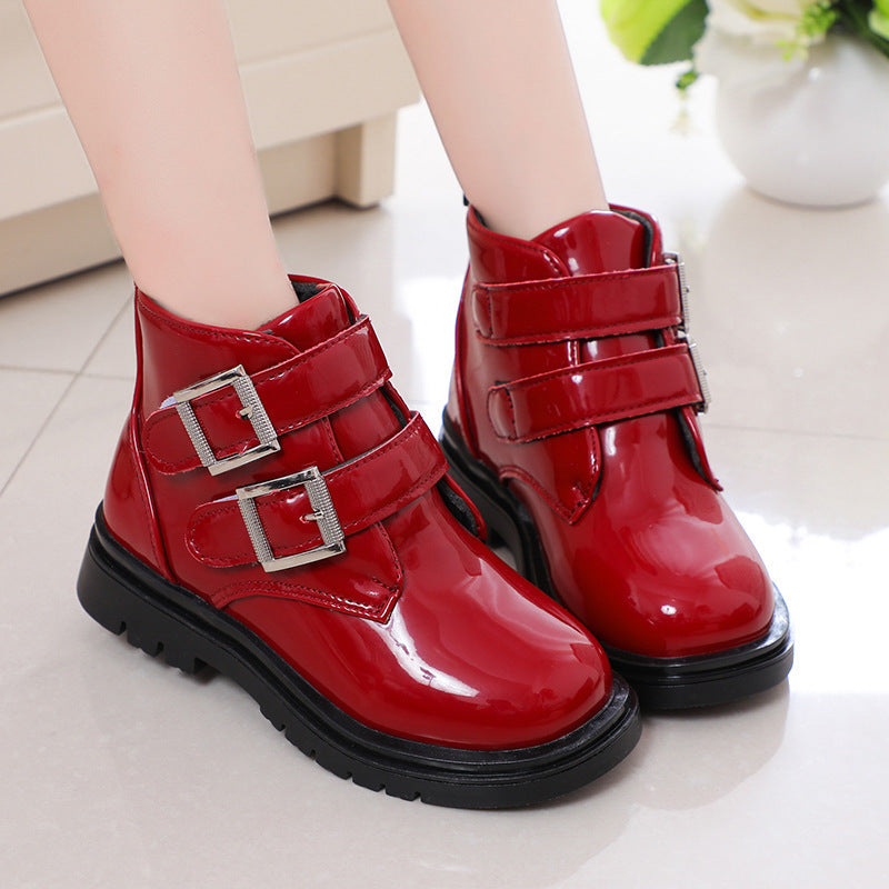 Kids' PU short riding boots in red with glossy finish, two buckles, and tread sole