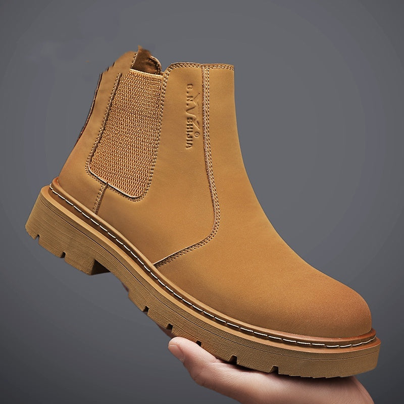 Tan high-top work boot with elastic side panels and rugged thick outsole