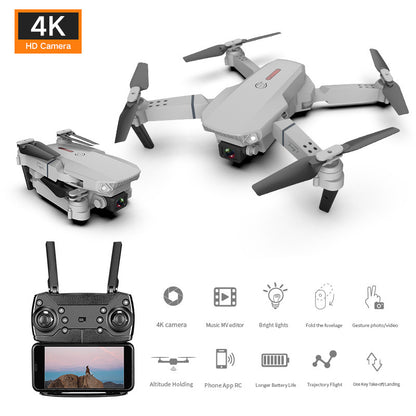 A gray 4K aerial drone with dual cameras, displayed in different positions showcasing its features like foldable design, LED lights, and remote control.