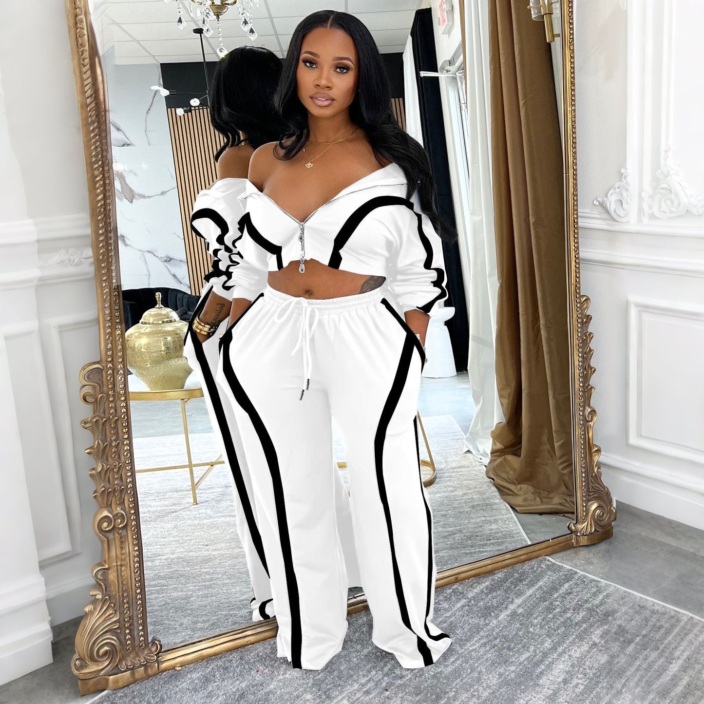 Contrast-striped two-piece cardigan set with off-shoulder cropped top and drawstring pants, white/black