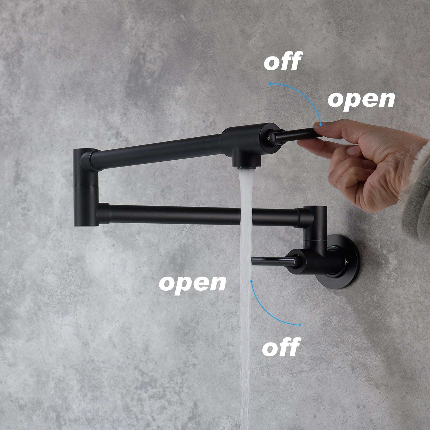Matte black wall-mount pot filler faucet in open position with water flowing