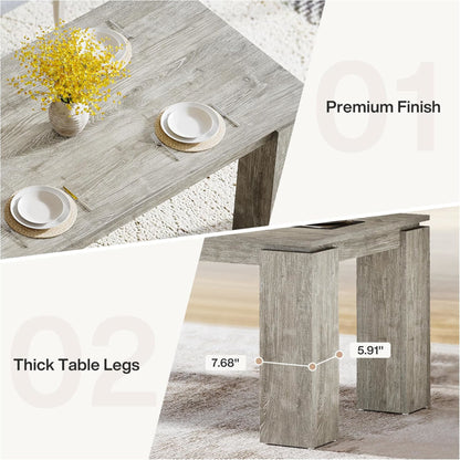 Rectangular dining table with thick legs and gray wood grain top, close-up view