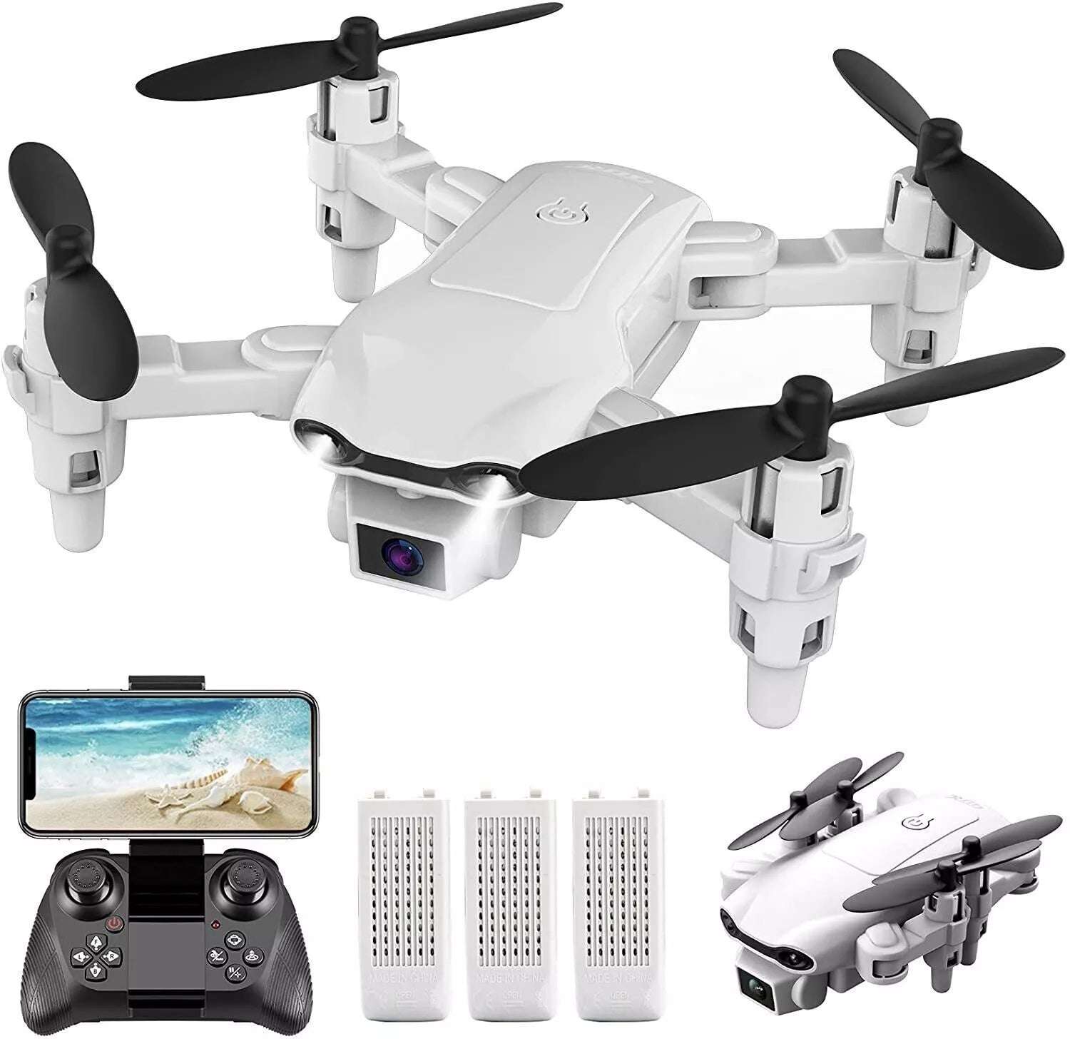 White drone with black propellers, remote control, and batteries on a white background